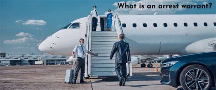 Can I fly to Mexico if I have a warrant?