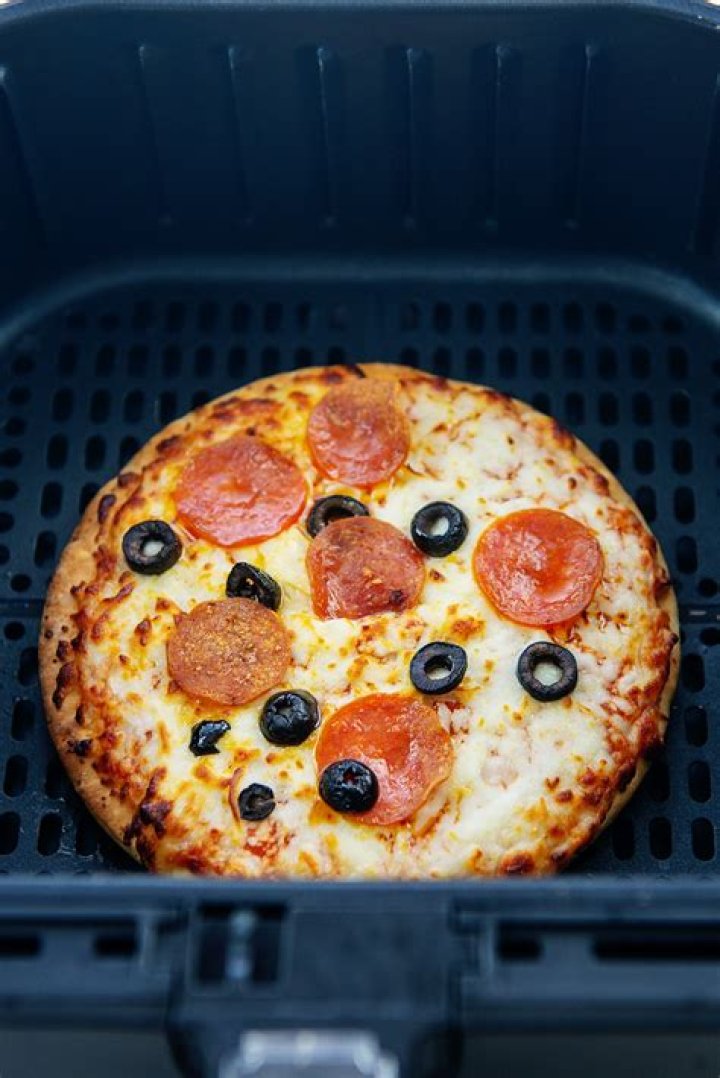 How do you cook frozen pizza in an air fryer?