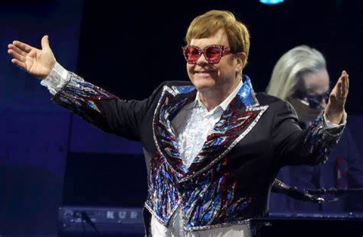 How old is Elton John?